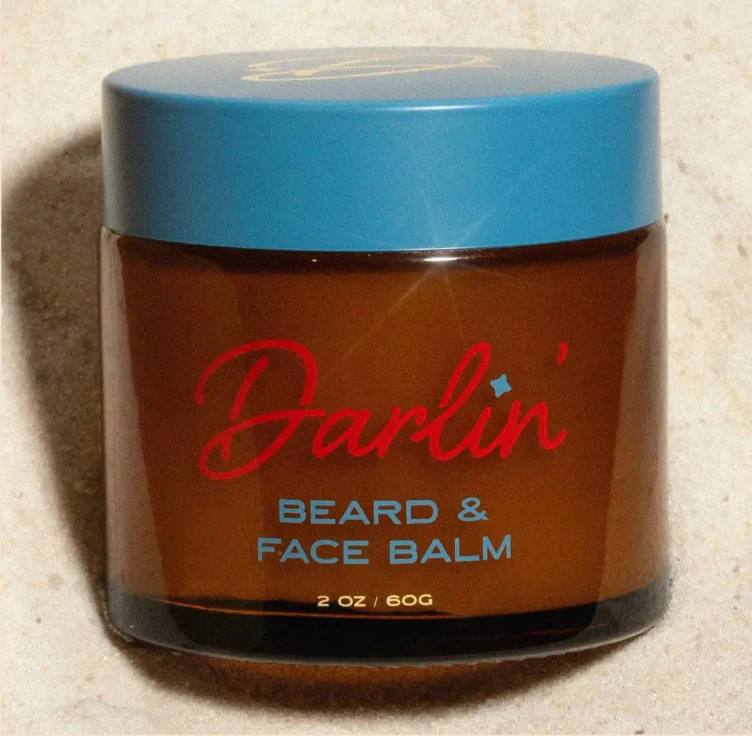 Darlin Skincare beard and face balm jar with lid, showcasing the nourishing balm for facial hair and skin care.
