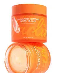 Darlin Skincare Sugared Citrus Body Balm jar with citrus fruit illustrations, showcasing the luxurious moisturizing product.