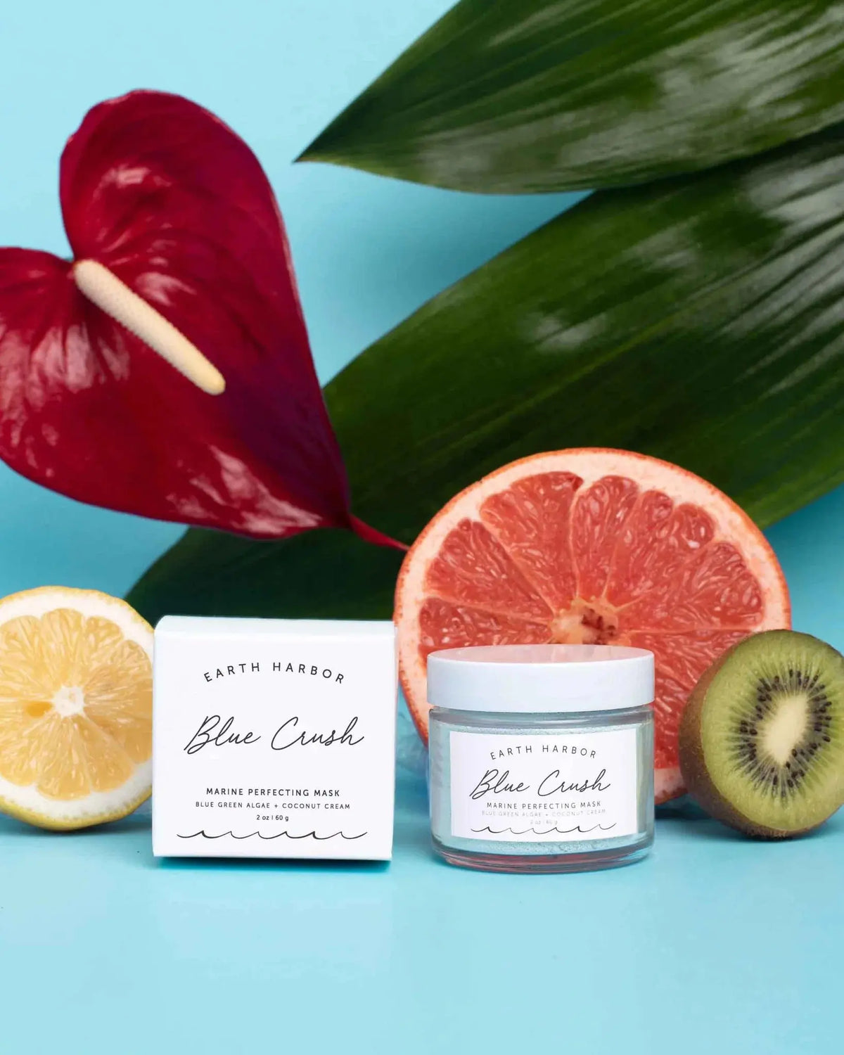 Blue Crush Marine Perfecting Mask by Earth Harbor, showcasing a vibrant blue mask in a sleek jar with a textured surface.