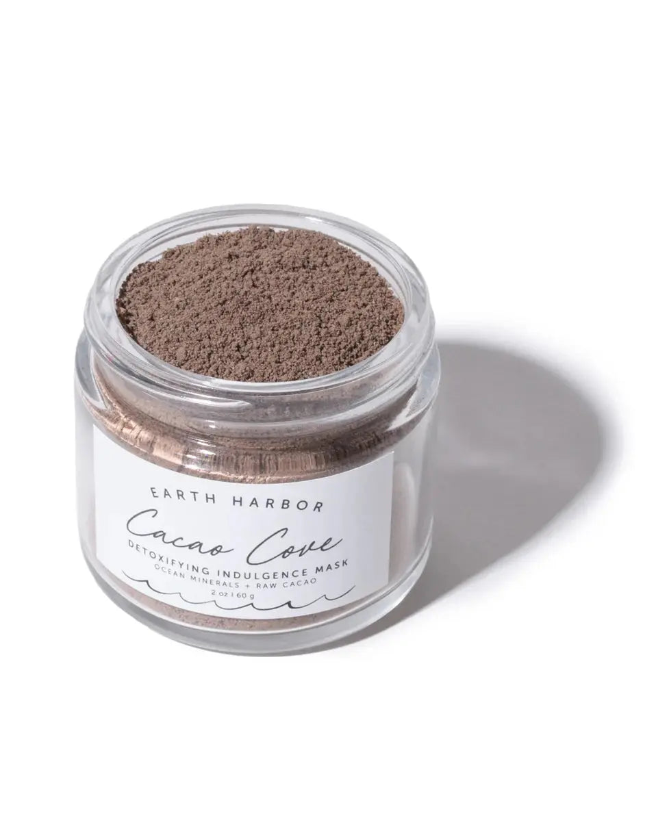 Earth Harbor Cacao Cove Detoxifying Vitamin C Mask in a sleek jar, featuring rich chocolate color and natural ingredients.