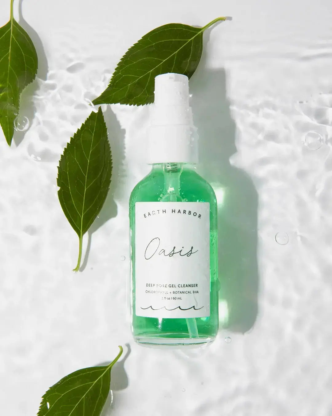 Earth Harbor Oasis Deep Pore Gel Cleanser for skincare, showing the gel cleanser in a clear bottle with a white cap.