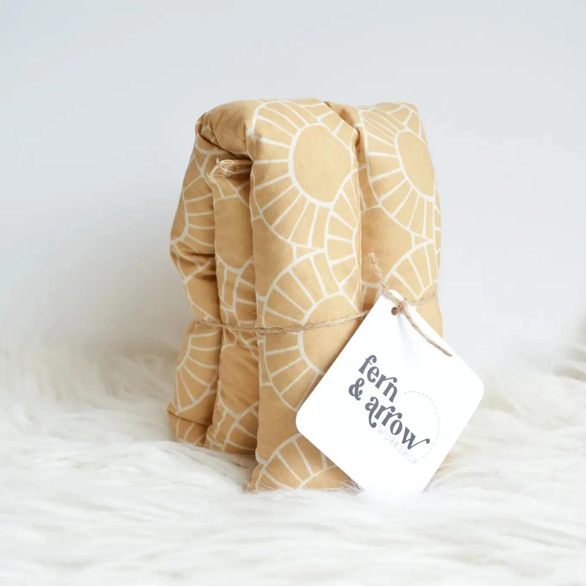 Fern and Arrow Aroma Therapy Neck Wrap in Juliette Stripe, a soft, personalized neck wrap for soothing aromatherapy and comfort.