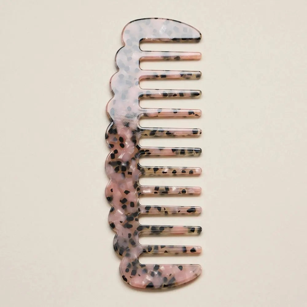 Pink confetti varsity comb by Frem, a stylish hair accessory with a colorful, decorative design for hair styling.