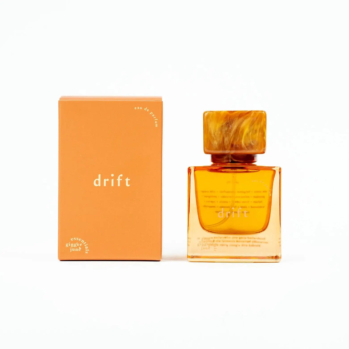 Ginger June Drift Essential Oil Perfume bottle with elegant packaging, showcasing natural and aromatic scent in a sleek design.
