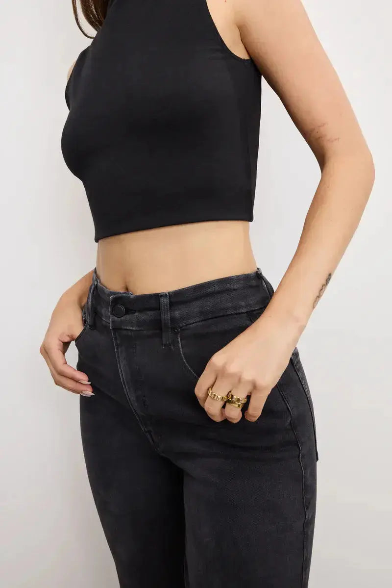 Good American True Straight jeans displayed on a hanger, showcasing classic denim fit and clean design.