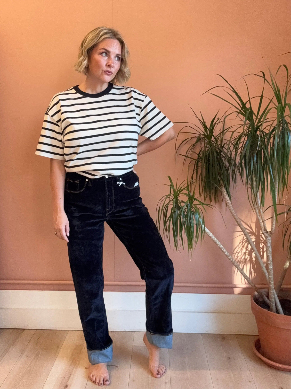 Good American Velvet Denim Jeans, stylish apparel featuring a classic denim design with a velvet finish, shown on a model.
