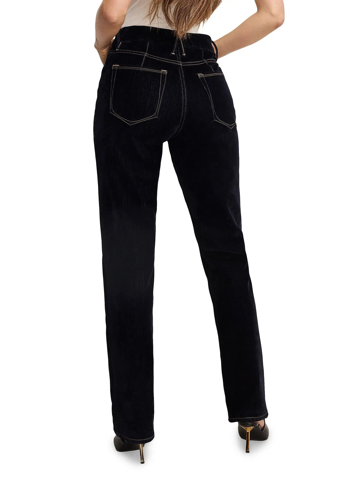 Good American Velvet Denim Jeans, stylish women’s apparel with a modern fit and velvet fabric, shown on a model.
