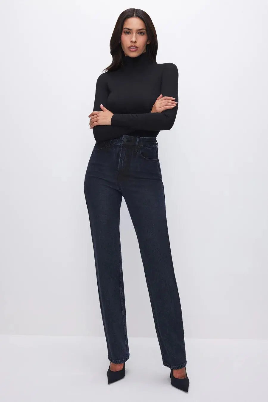 Good American Jane Bodysuit, a stylish black top with a fitted design, featuring long sleeves and a scoop neckline.