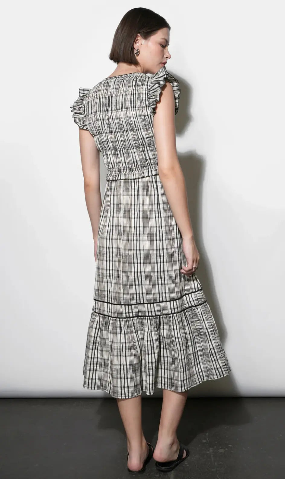 Greylin Eloise tie-front midi dress in lightweight fabric, featuring a fitted bodice and flowing skirt, ideal for casual or dressy occasions.
