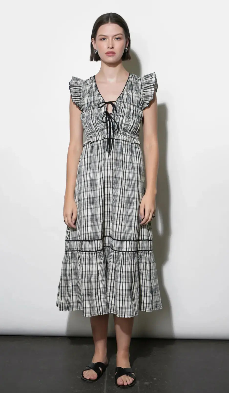 Greylin Eloise tie-front midi dress in lightweight fabric, featuring a V-neck, short sleeves, and a flattering waist tie.