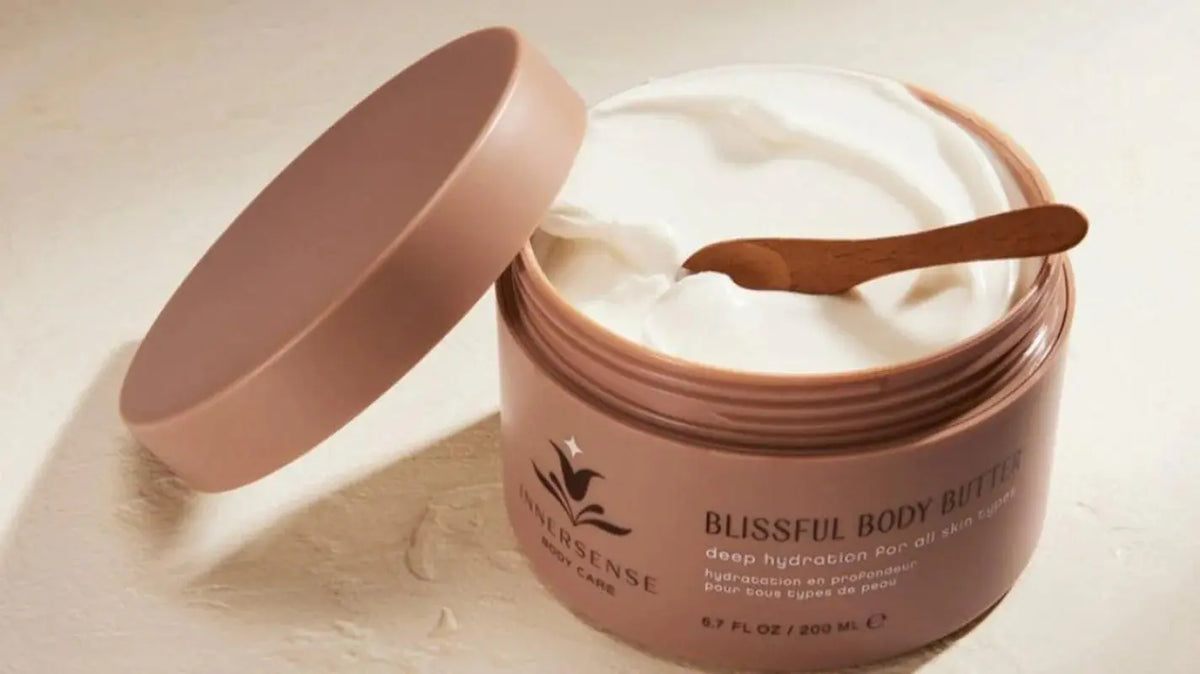 Innersense Organic Beauty Blissful Body Butter jar with creamy texture and natural ingredients for nourishing skin.