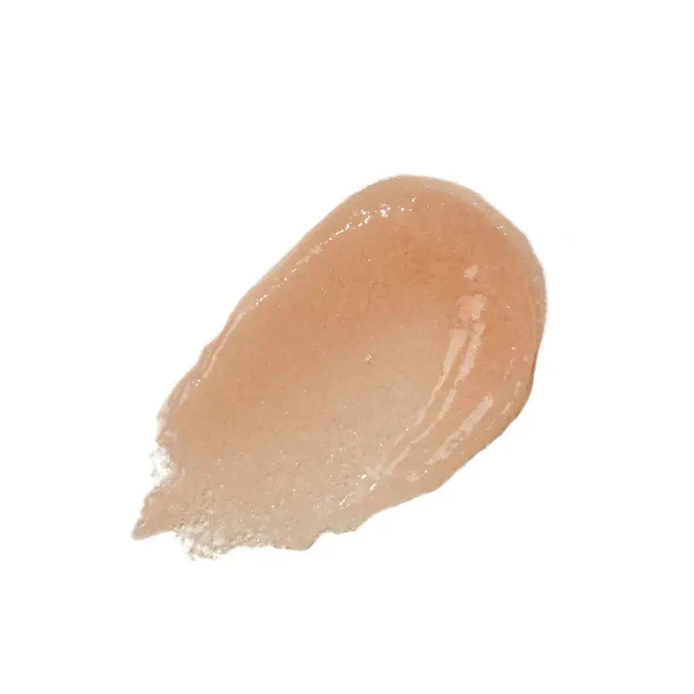 Innersense Organic Beauty Inner Glow Body Scrub jar showing the product label and textured scrub surface.