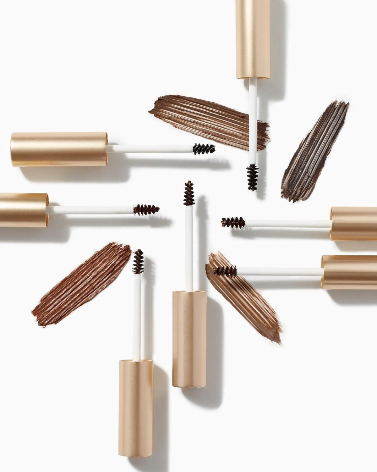 Jane Iredale PureBrow® brow gel in ash blonde with a clear tube and brush applicator, showcasing the product and branding.