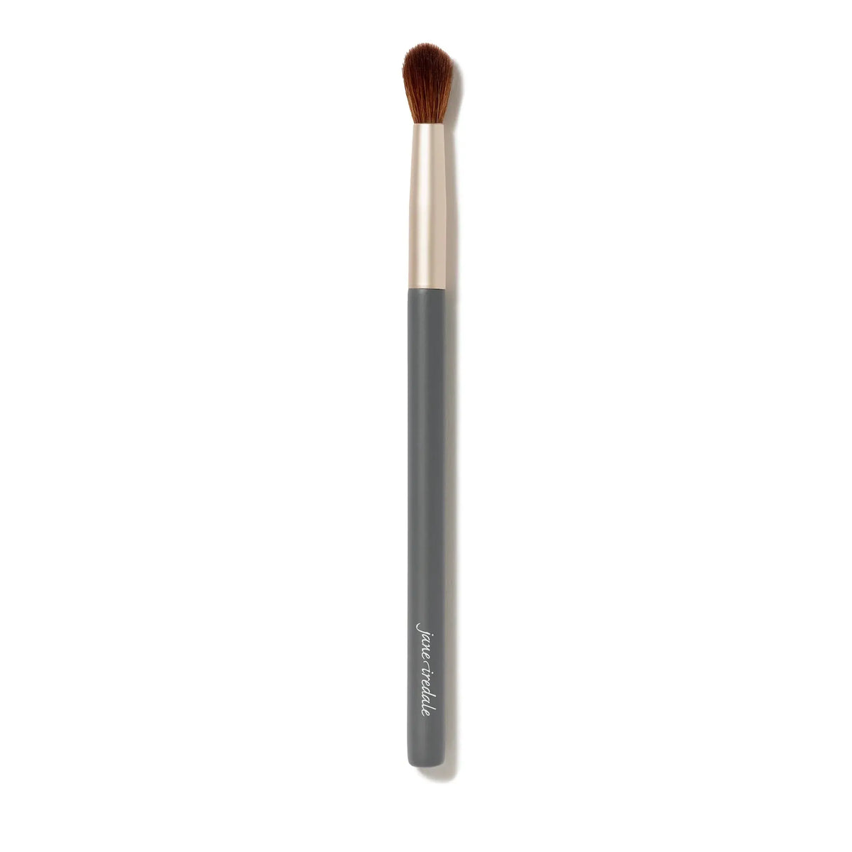 Jane Iredale crease brush with soft bristles for blending eyeshadow in a sleek, professional makeup applicator design.