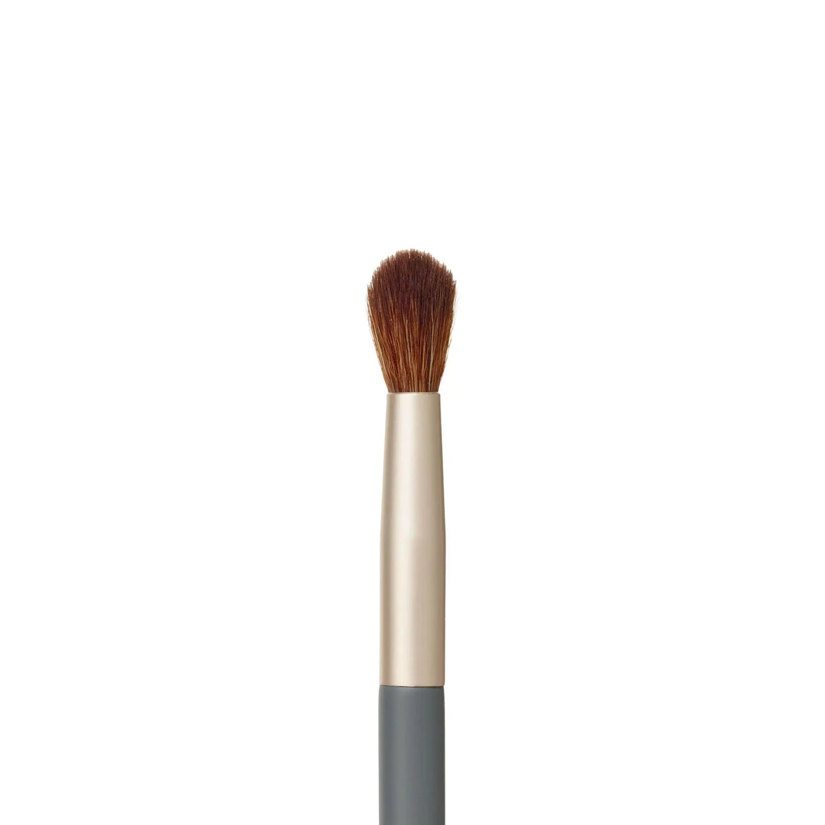 Jane Iredale crease brush with soft bristles for blending eyeshadow and creating detailed eye makeup looks.
