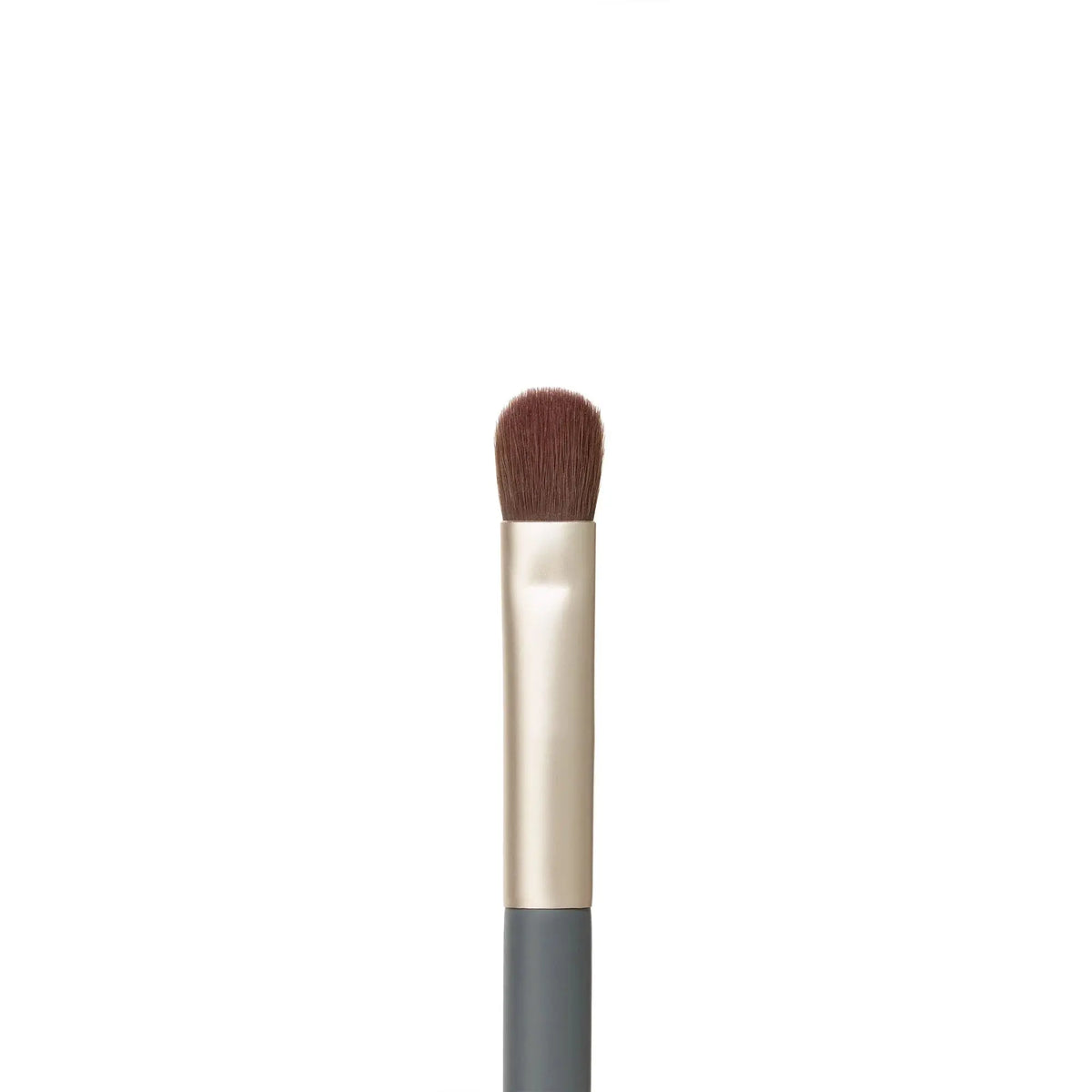 Jane Iredale flat eye brush shown with soft bristles and sleek handle, ideal for precise eyeshadow application.