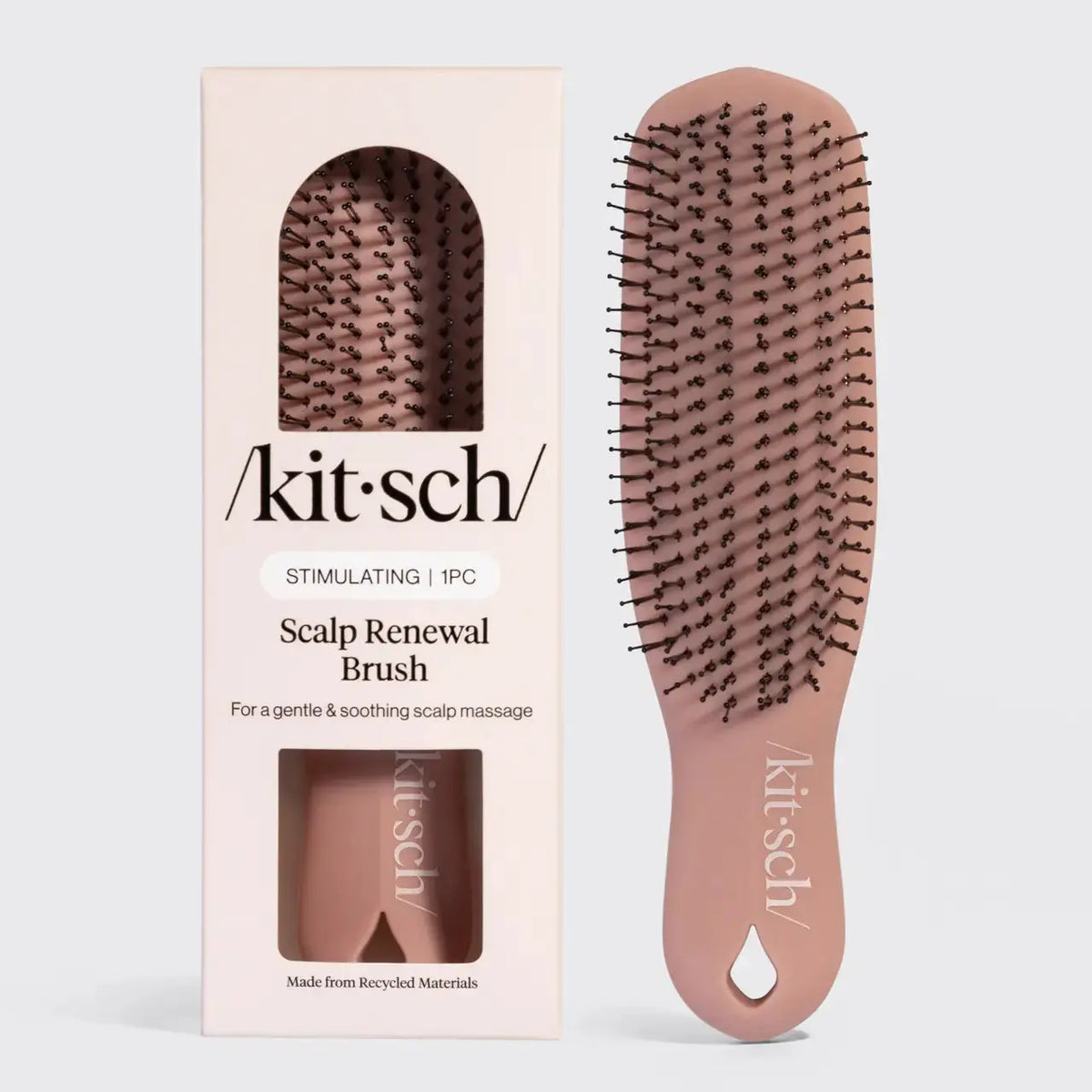 Kitsch Scalp Renewal Brush, a hair accessory with soft bristles for gentle scalp massage and hair detangling.