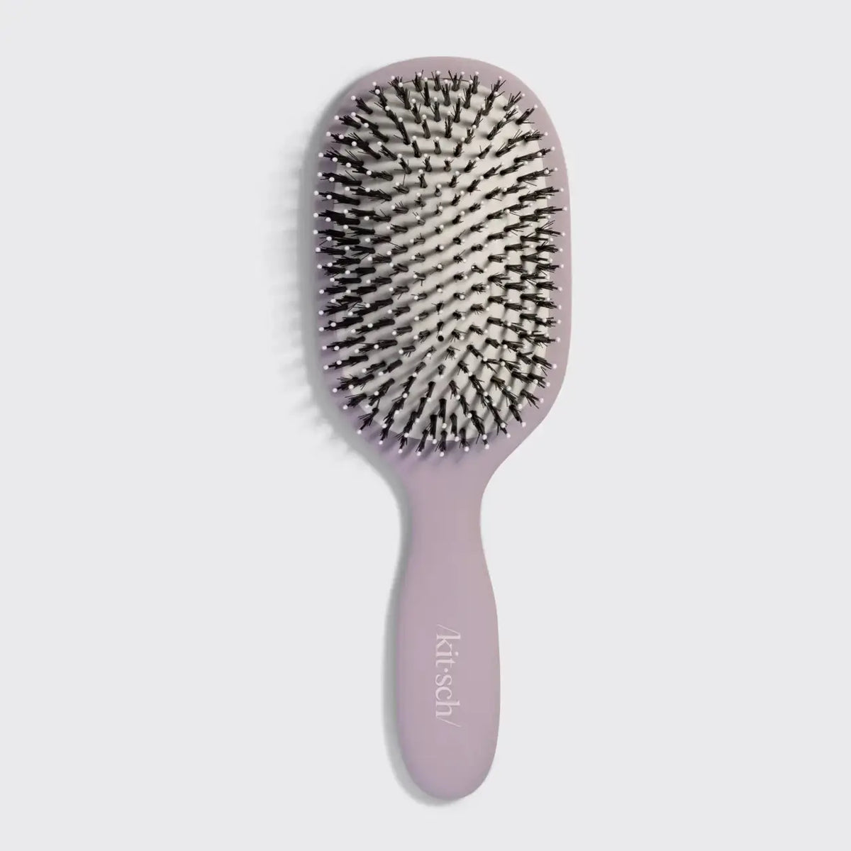 Pink Kitsch Smooth & Polish Hair Brush with soft bristles for gentle detangling and styling.