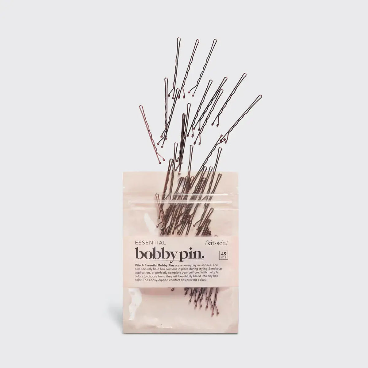 Kitsch hair bobby pins in various sizes for securing and styling hair, shown in a close-up image.