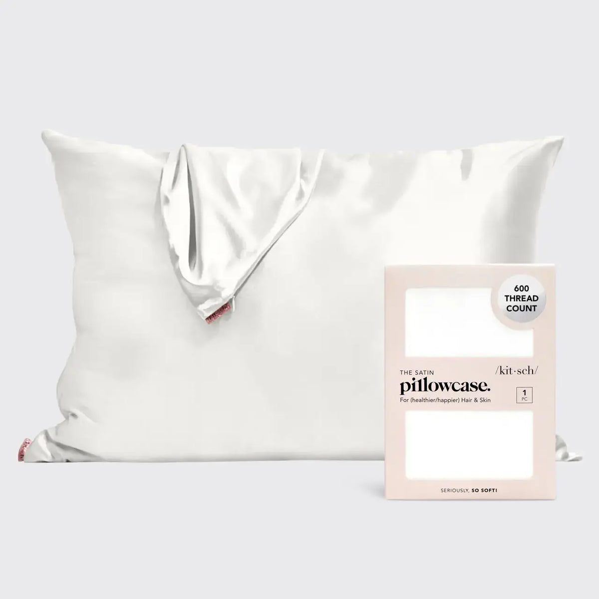 Kitsch ivory satin pillowcase designed for hair protection, smooth texture, and luxurious sleep experience.
