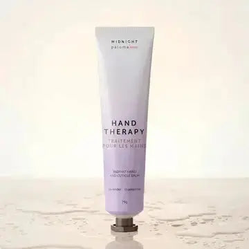 Midnight Paloma lavender and chamomile hand therapy jar with soothing herbal ingredients and natural floral scent.