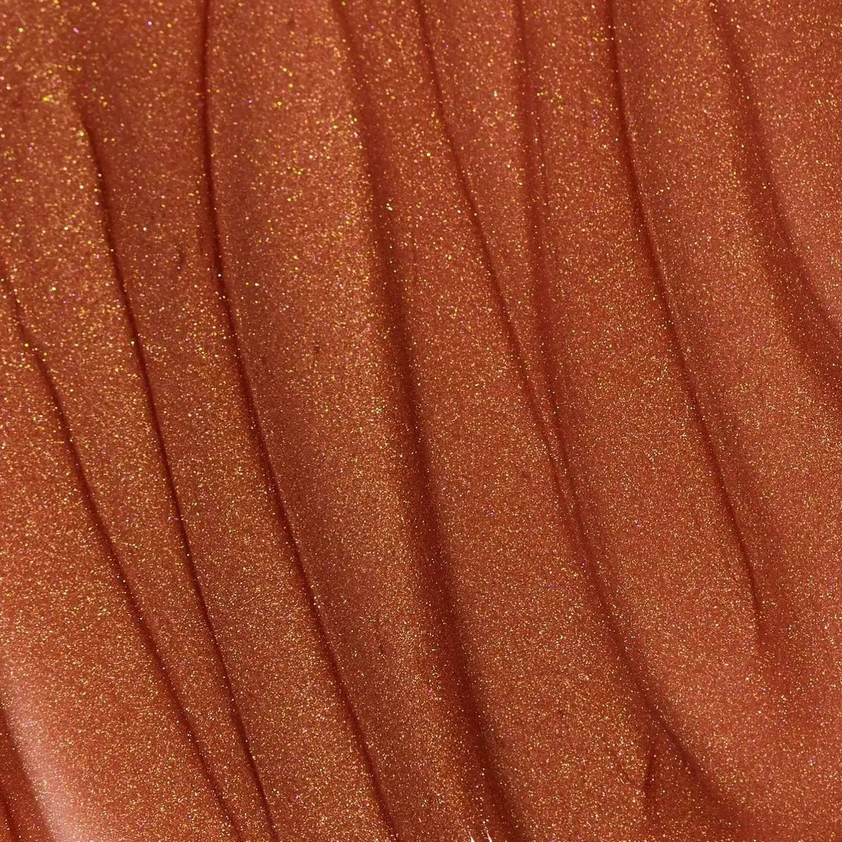Minori Ultra-Hydrating Vegan Lip Gloss in a clear tube with a shiny, moisturizing finish, designed for natural, glossy lips.