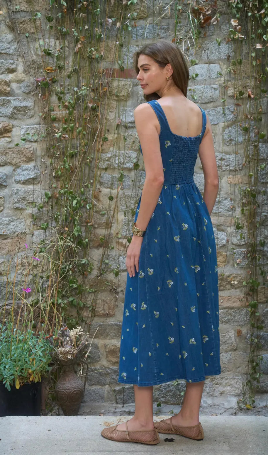 Moonriver Meadowline Denim Midi Dress, small size, featuring classic denim fabric, fitted bodice, and flowing skirt.