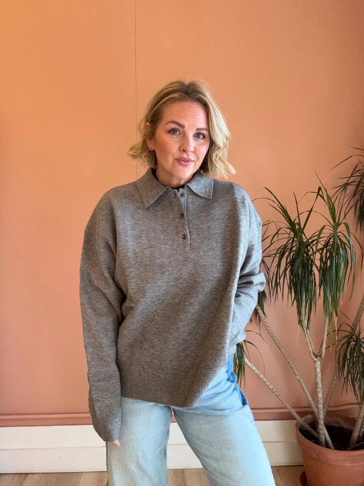 Gray Nia Marlow Sweater in cozy polo knit, shown in extra small size, featuring a comfortable, stylish design ideal for casual wear.
