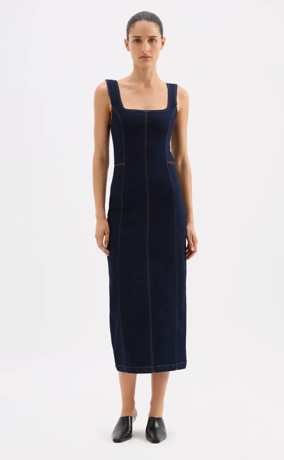 Nude Lucy Vita Denim Maxi Dress displayed on a model, showcasing its flowy fabric, sleeveless design, and casual chic style.