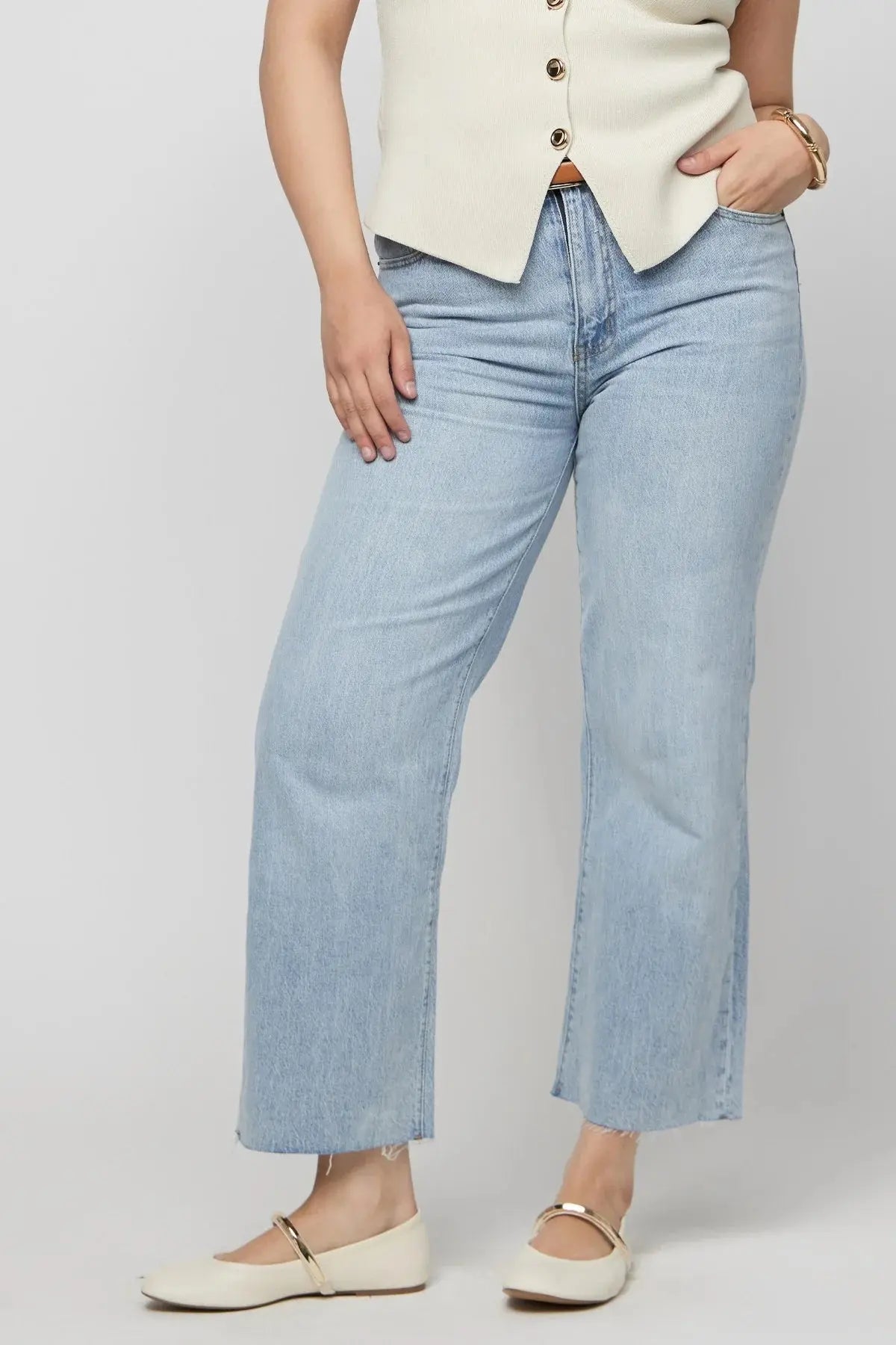 Oliver Logan Aberdeen Wide Leg Denim jeans, showcasing a relaxed fit and classic denim fabric in a natural stance.