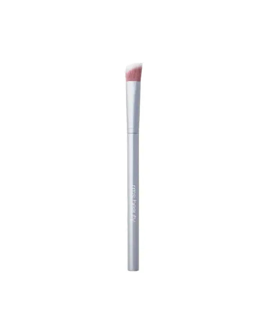 RMS Beauty cosmetics kabuki makeup brush with soft bristles for flawless application of powders and foundations.