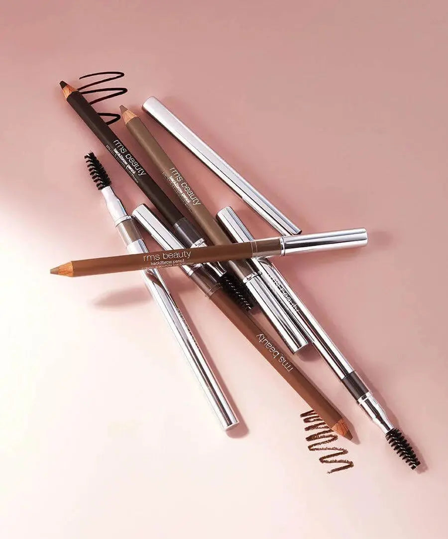RMS Beauty Back2Brow Pencil in light shade, close-up of the cosmetic brow pencil with spoolie applicator for natural-looking brows