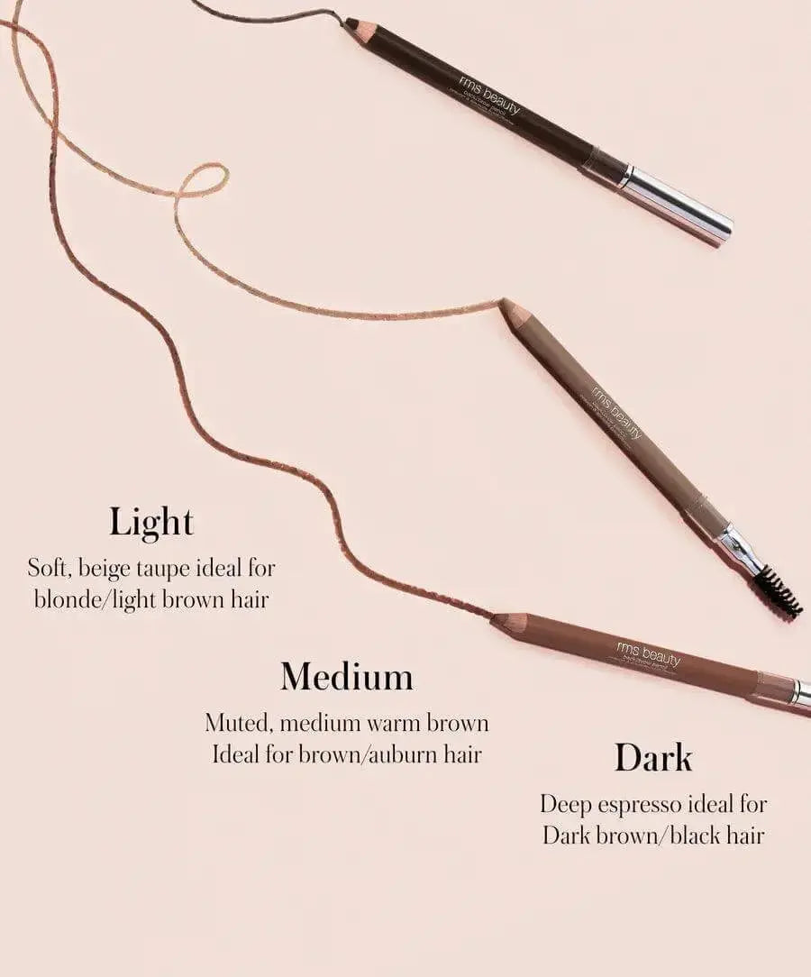 RMS Beauty Back2Brow Pencil in light shade, close-up of the cosmetic brow pencil with spoolie brush for natural eyebrow definition