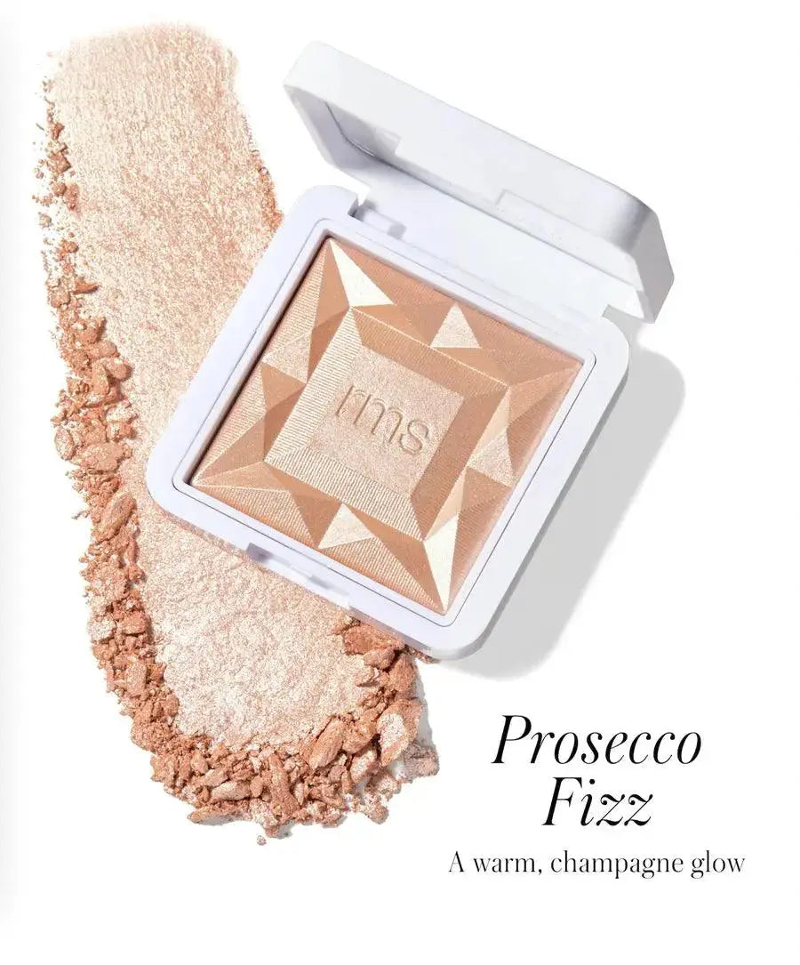 RMS Beauty ReDimension Hydra Dew Luminizer in Prosecco Fizz, a radiant cosmetics product with a luminous finish.