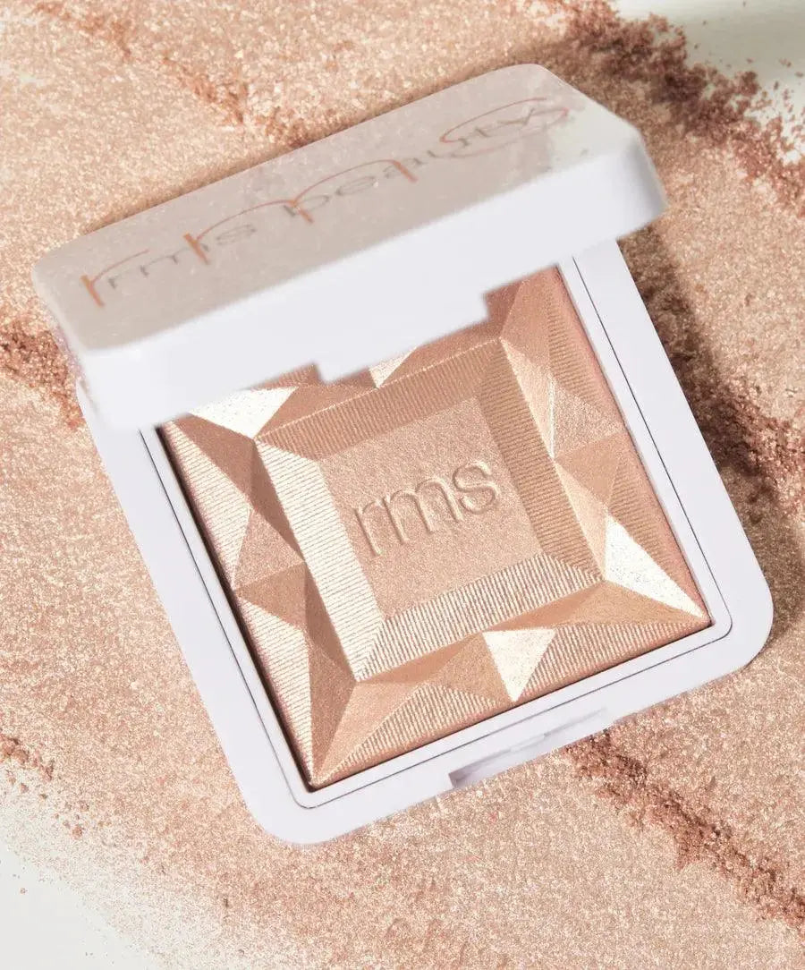 RMS Beauty ReDimension Hydra Dew Luminizer in Prosecco Fizz, a radiant cosmetic highlighter with a dewy finish.