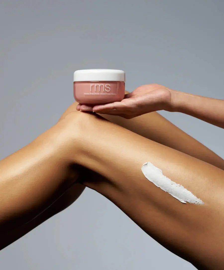 RMS Beauty Kakadu Body Butter in a jar, creamy moisturizer with natural ingredients for smooth, hydrated skin.