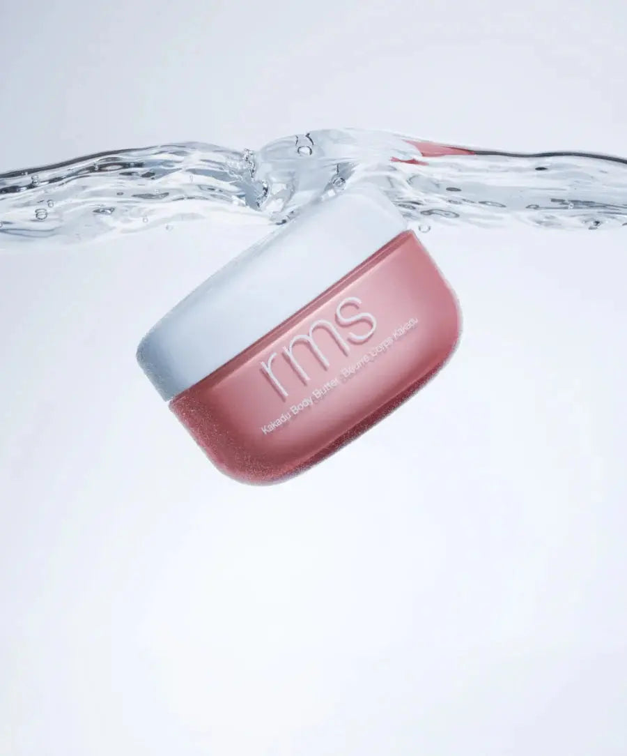 RMS Beauty Kakadu Body Butter jar with white lid and product label, showcasing the nourishing skincare product.
