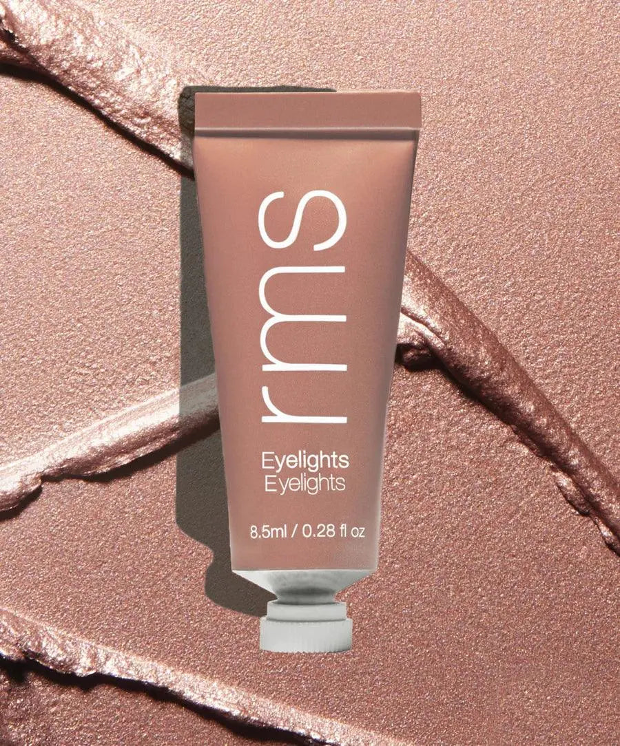 RMS Beauty Eyelights Cream Eyeshadow in flare, showcasing a smooth, shimmering eye shadow with a radiant finish.