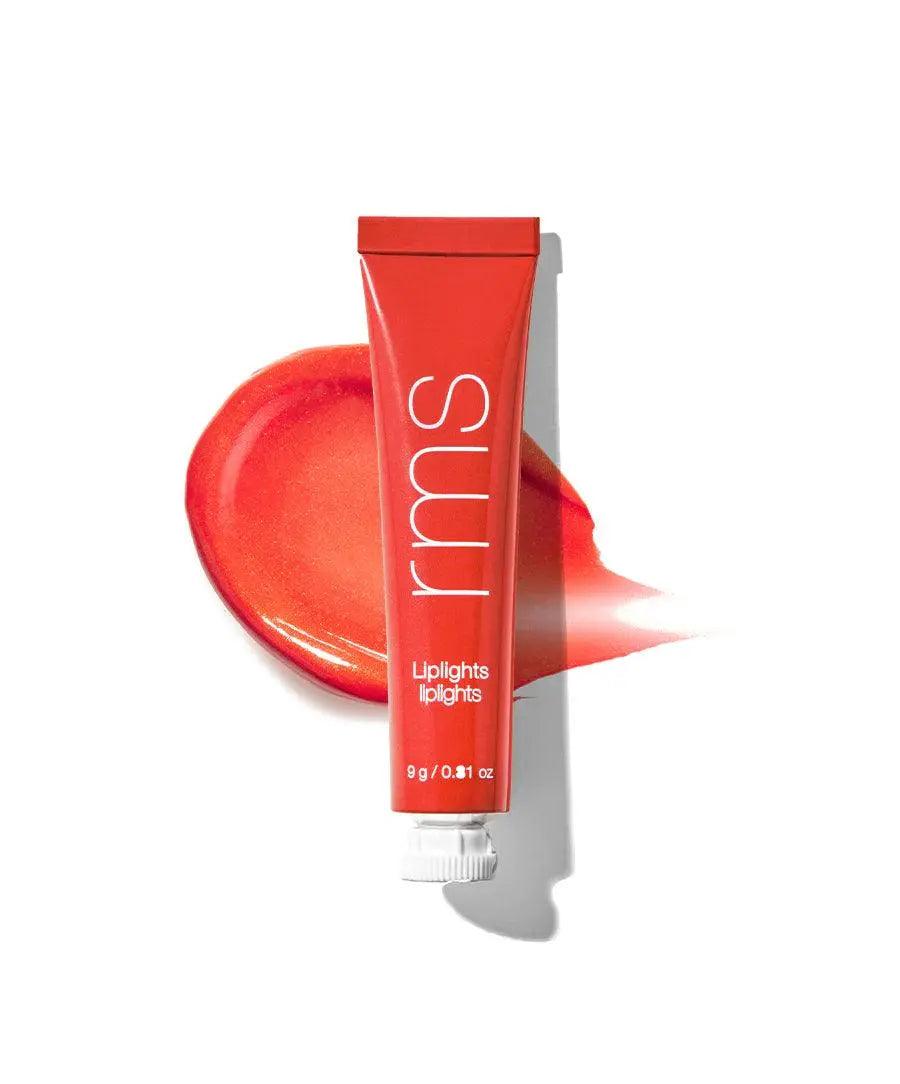 RMS Beauty Liplights Cream Lip Gloss in a natural nude shade, showing the sleek lipstick tube and product label.