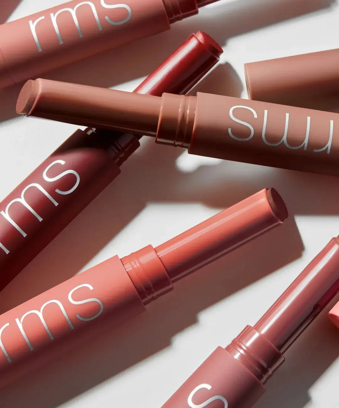 RMS Beauty Legendary Serum Lipstick in Nudes, showcasing a natural nude lipstick shade in a sleek tube with a smooth finish.