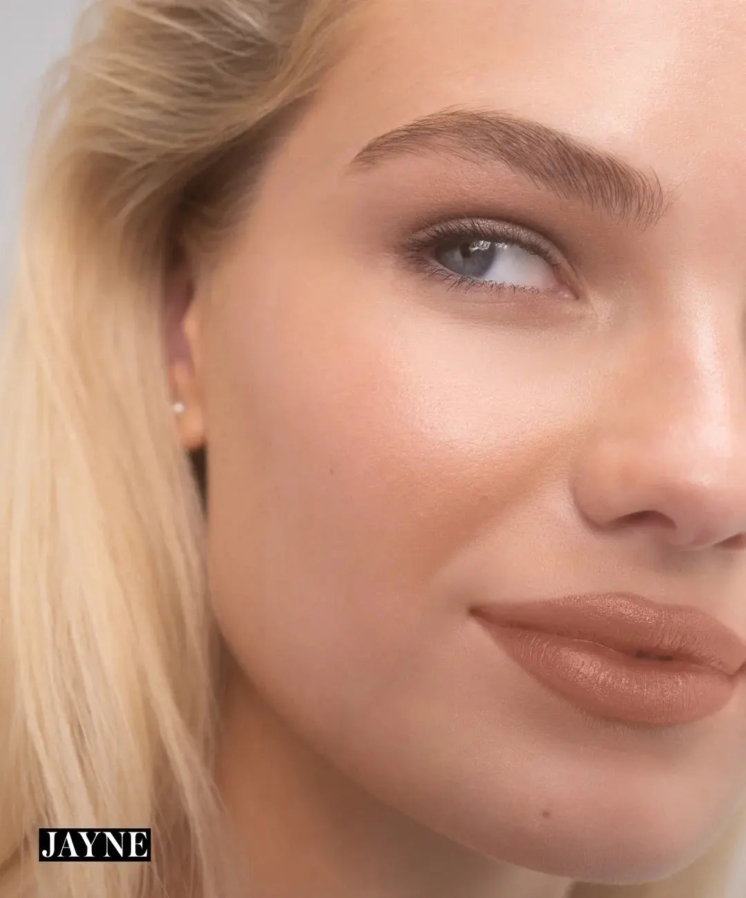 RMS Beauty Legendary Serum Lipstick in Nudes, natural nude lipstick with sleek packaging, displayed against a neutral background