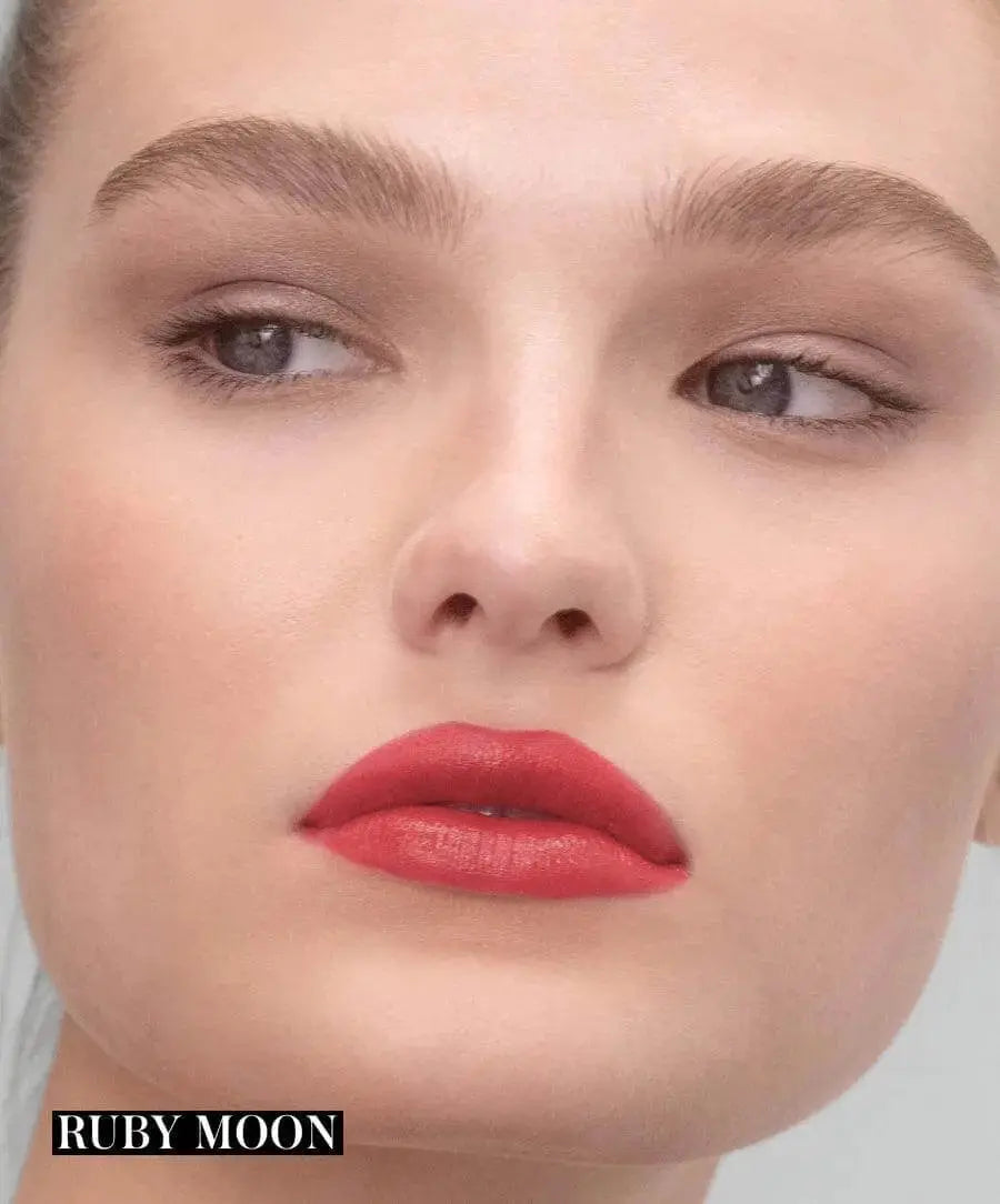 RMS Beauty Legendary Serum Lipstick in Monica, smooth beige lipstick with a shiny finish, in sleek packaging.