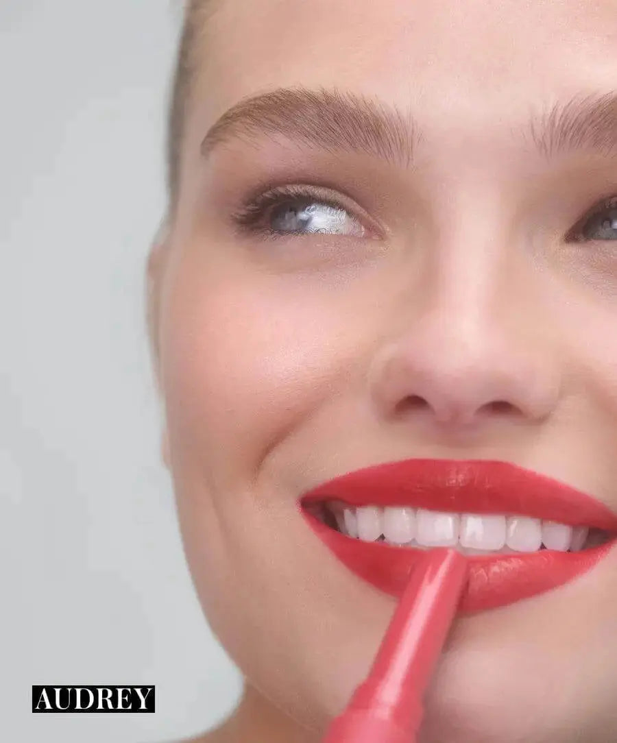 RMS Beauty Legendary Serum Lipstick in Monica, creamy lipstick with vibrant color and smooth finish, shown in close-up.