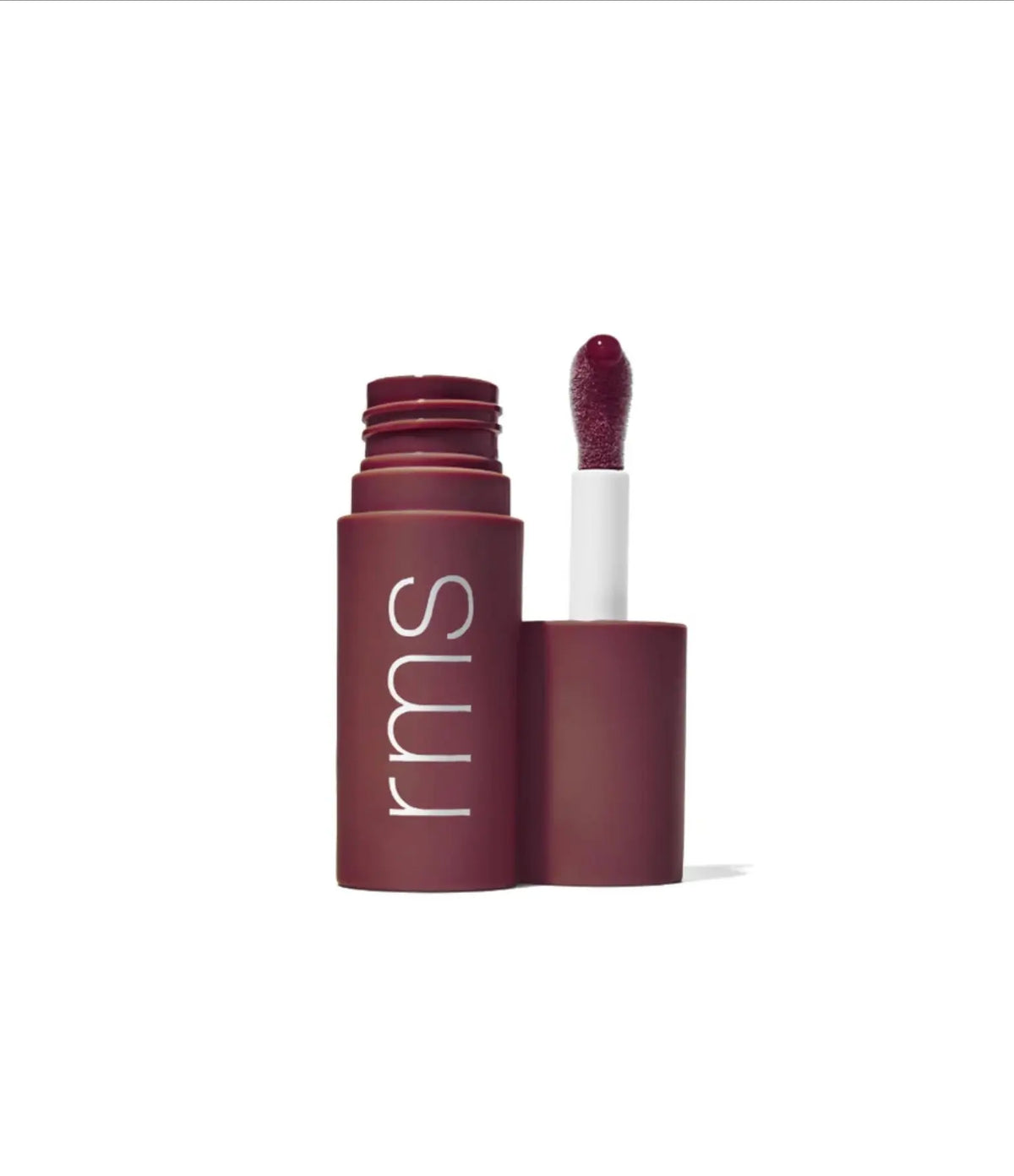 RMS Beauty Legendary Lip Oil in a clear glass tube with a doe-foot applicator, showcasing glossy, nourishing lip treatment.