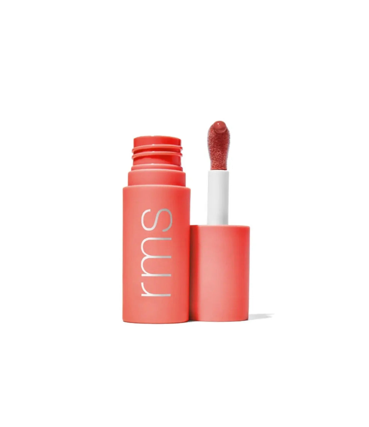 RMS Beauty Legendary Lip Oil applied on lips, featuring a glossy finish with subtle shimmer, in a sleek transparent tube.