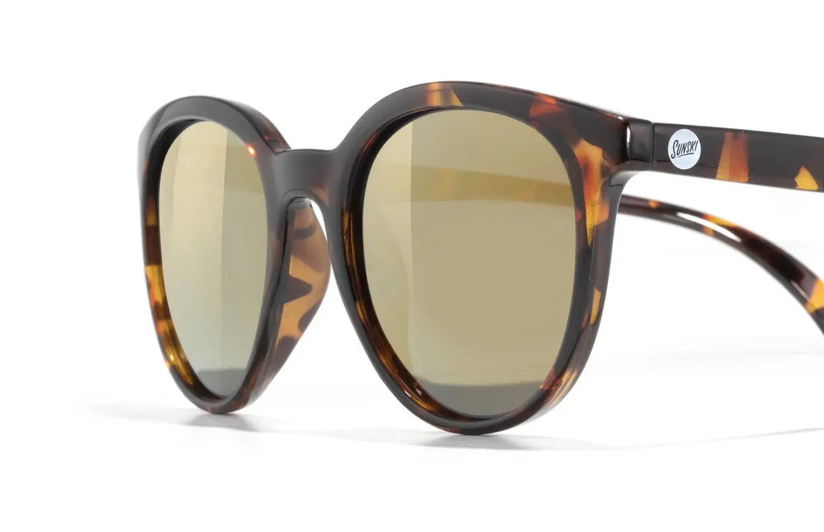 Sunski Makani tortoise gold sunglasses with round frames and tinted lenses, stylish eyewear for sun protection.