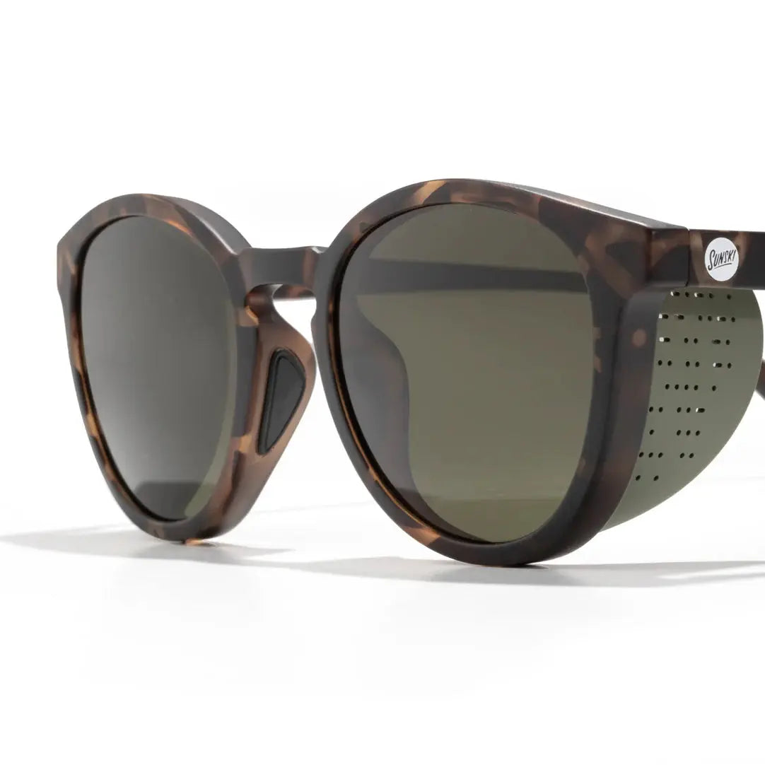Sunski Tera polarized sunglasses with black frames and tinted lenses, designed for stylish sun protection and outdoor activities.