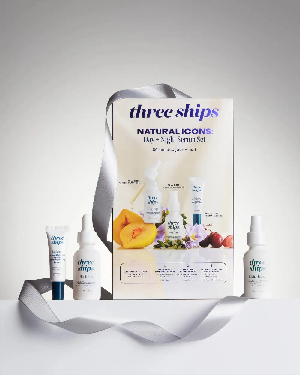 Three Ships Natural Icons Day and Night Serum Set featuring two sleek bottles with minimalistic labels and dropper caps.
