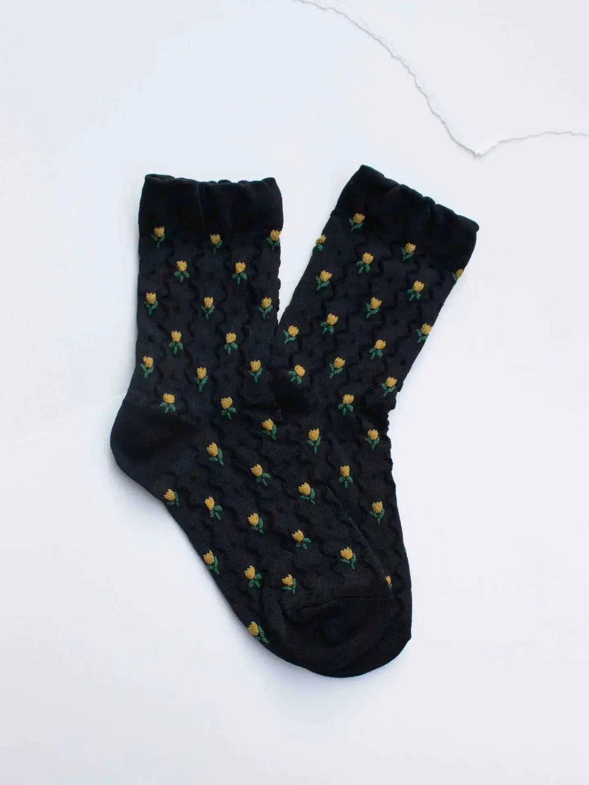 Ivory mini tulip flower socks by Tiepology featuring colorful tulip patterns on soft, comfortable knit fabric.