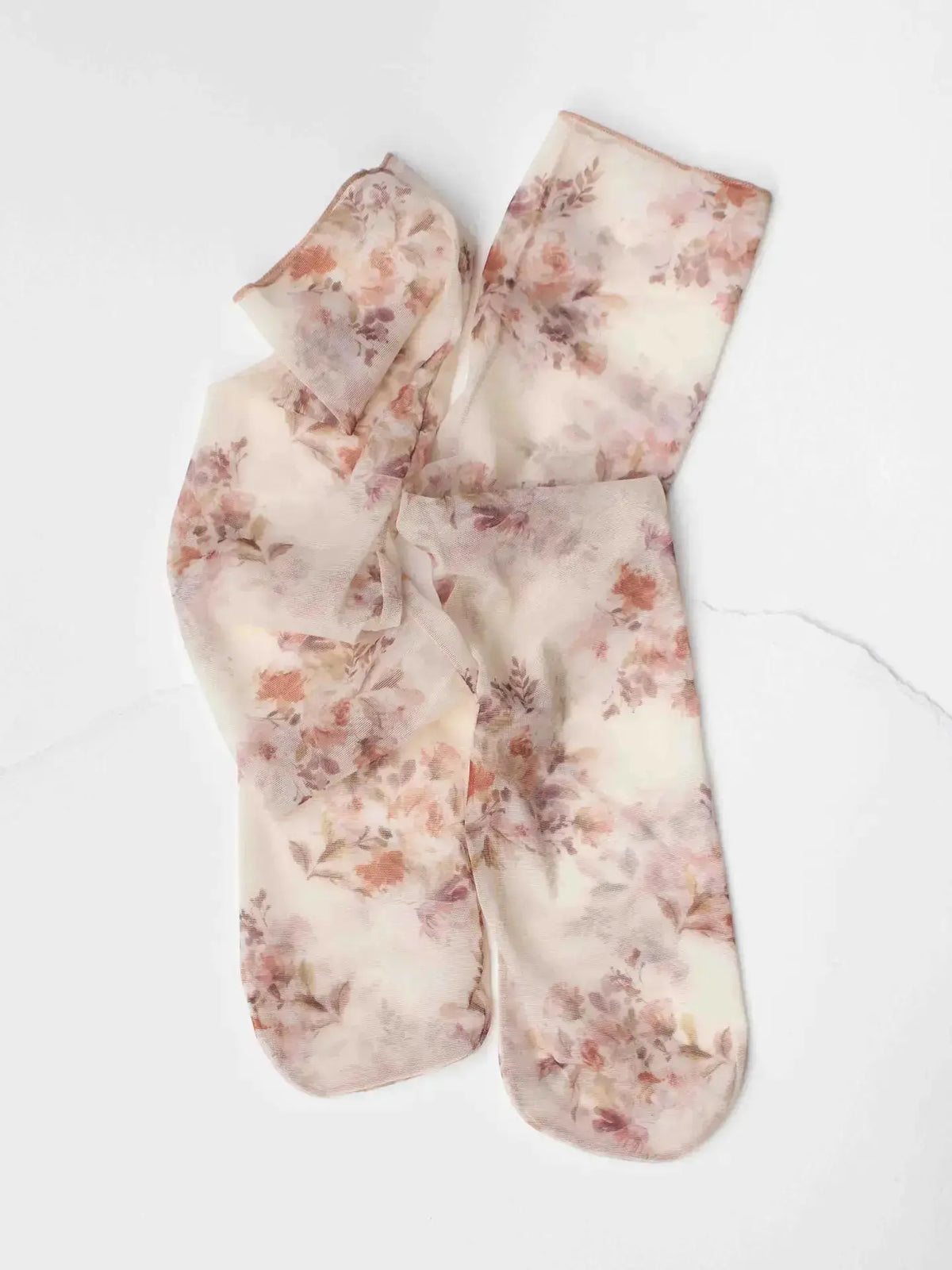 Tiepology June Sheer Socks in dusty rose, featuring lightweight, semi-transparent fabric and a comfortable fit.